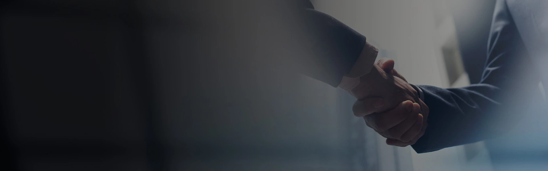 Success stories hero banner of handshake
